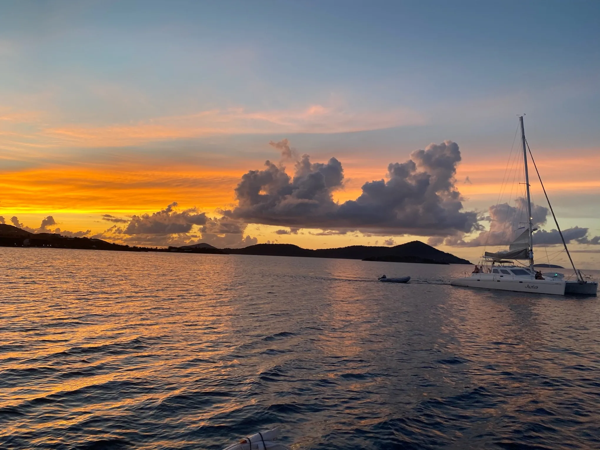 a small boat in a large body of water