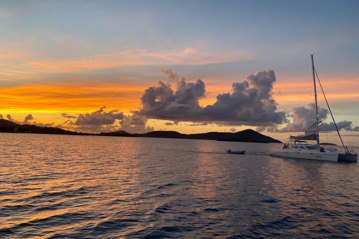 a small boat in a large body of water