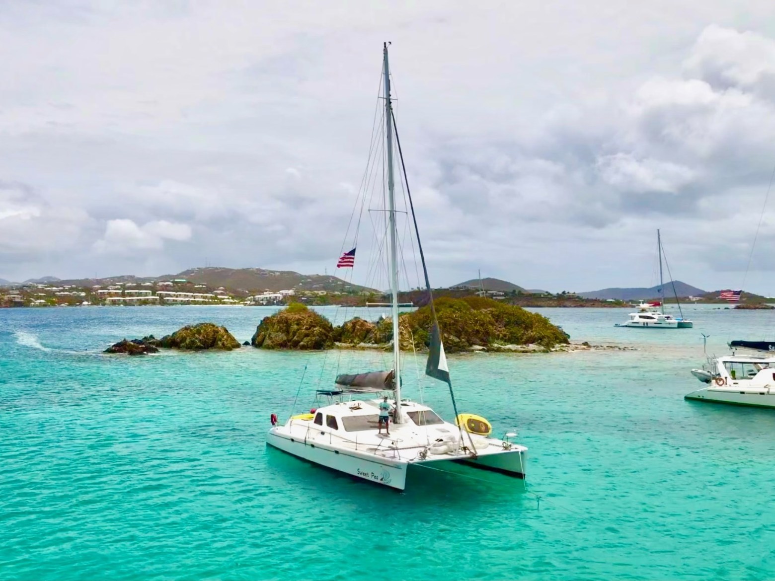 a boat is docked next to a body of water