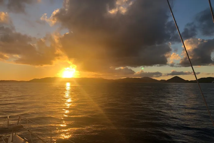 a sunset over a body of water