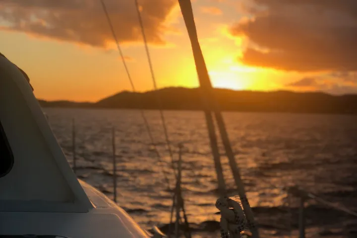 a sunset over a body of water