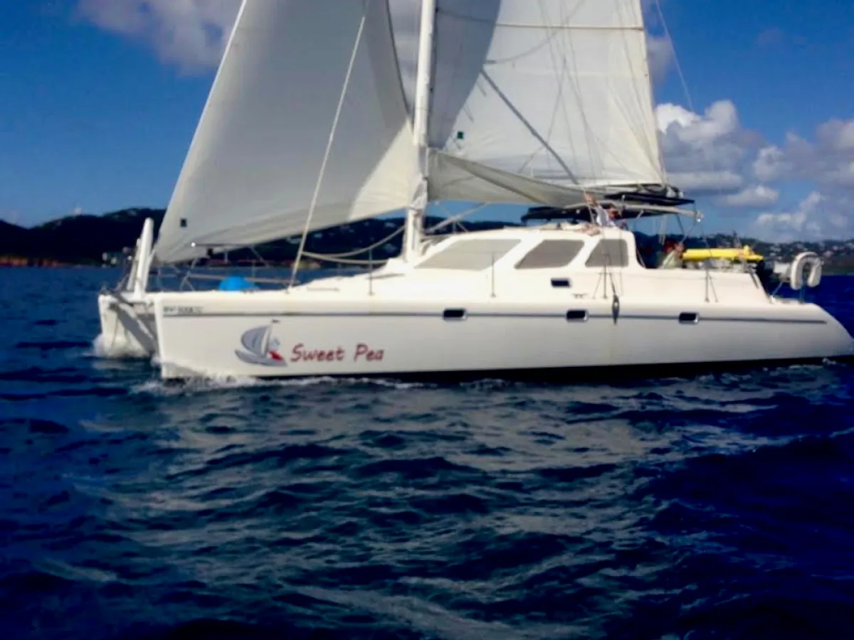 a small boat in a large body of water