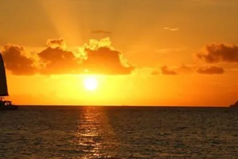 a sunset over a body of water